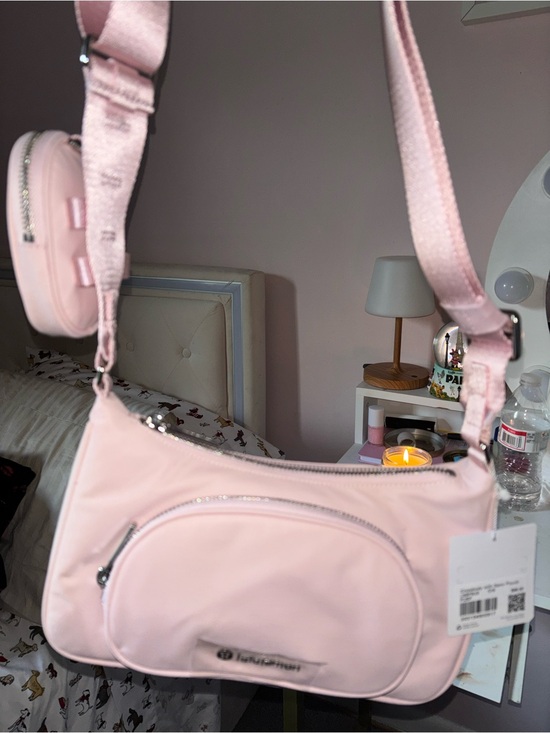 lululemon athletica Handbags - Brand new baby pink lululemon crossbody bag with detachable strap